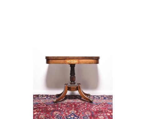 A 19th century inlaid rosewood fold-over card tableThe D-shaped top inlaid with brass stringing and enclosing a green baize s