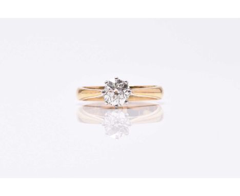 A 22ct gold single stone diamond ring, the old cut diamond claw set in white gold to yellow gold shank, ring size U, weight a