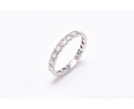 A diamond eternity ring, the brilliant cut diamonds claw set in white metal, ring size M, weight approx 1.7gCondition:Total n