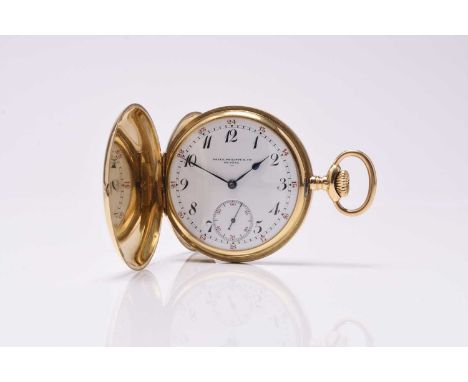 Patek Philippe: An 18ct gold hunter pocket watch Date: Circa 1890 Movement: Jewelled bridge plate, signed and numbered 85669,