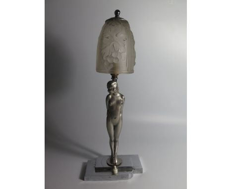 An Art Deco Chrome Figural Table Lamp of standing nude with frosted glass shade 