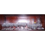 A web cut glass table service for six, together with a decanter, two brandy glasses and one other