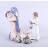 A Copenhagen figure of a faun with a parrot, 752, two merchildren, 2313 and 2348 (damages) and a