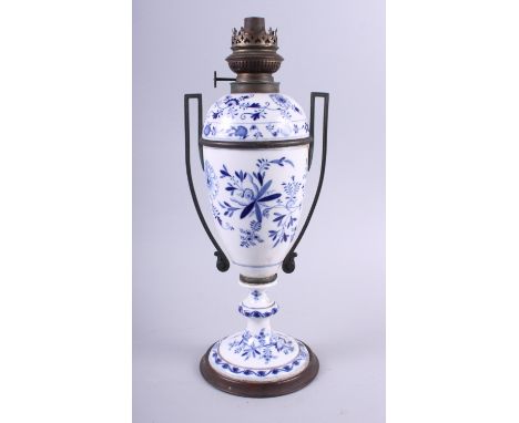 A 19th century German porcelain blue and white oil lamp base, three paperweights, two enamelled trinket boxes, a stopwatch an