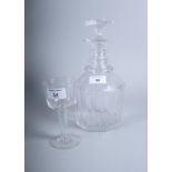 A 19th century hollow stem glass and a three-ring necked cut glass decanter and stopper