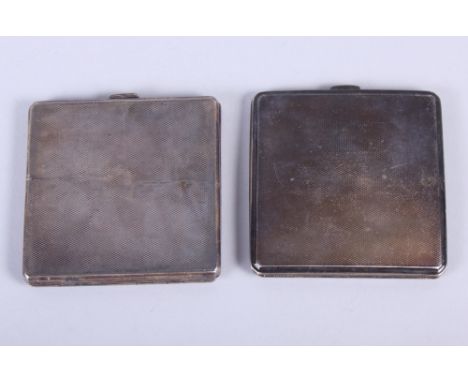 Two silver cigarette cases with engine turned decoration, 6.6oz troy approx