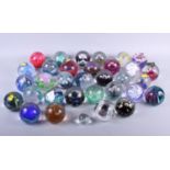 A collection of Caithness paperweights (mostly chipped)