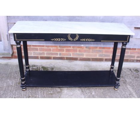 An ebonised and gilt painted two-tier console table of Regency design with faux marble top, 53" wide