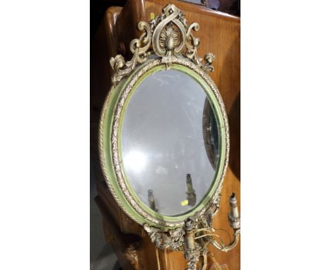 A two-light girandole with openwork crest, plate 14 1/2" x 19", in silvered frame