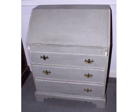 A grey painted fall front bureau with fitted interior over three drawers, on bracket feet, 31" wide