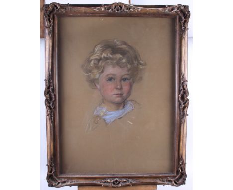 An early 20th century pastel portrait of a young boy, monogrammed IC, 17 1/2" x 23 1/2", in gilt decorated frame