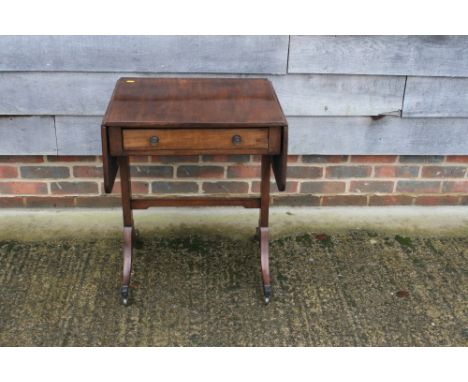 A 19th century mahogany and ebony strung "sofa" table, fitted one drawer on panel end, on splay supports, 22" wide