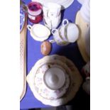 An early 20th century Royal Crown Derby pattern part teaset, decorated in the "Derby Posie"