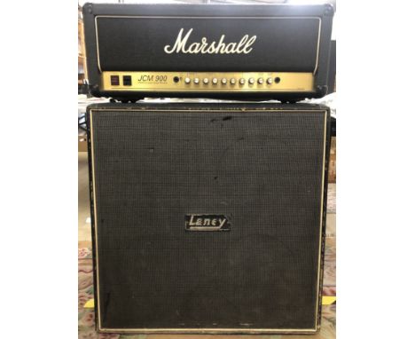 Guitar Amp - A Marshall JCM 900 100 Watt Hi Gain Dual Reverb guitar amplifier along with a Laney speaker cabinet