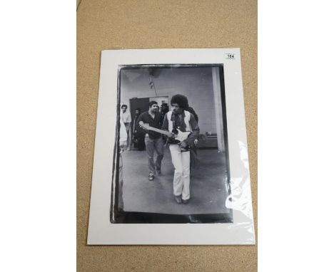 Music Memorabilia - Photo of Jimi Hendrix walking backstage at Madison Square Gardens New York for his shortest concert, cut 