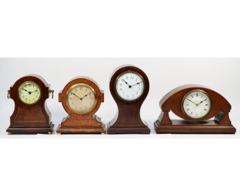 Four manual movement mantel clocks to include a Walker &amp; Hall Ltd and three other unnamed versions. 14cm high, 18cm high,