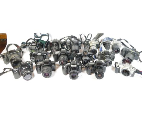 Twenty three SLR vintage film cameras to include a Minolta 500si, a Nikon F50, a Praktica BC1, a Pentax MZ-30 and a Canon EOS