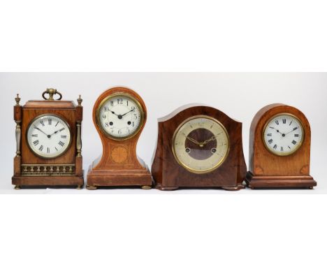 Four manual movement mantel clocks, early 20th Century and later, one Smiths, three unnamed versions. Tallest is 22cm.