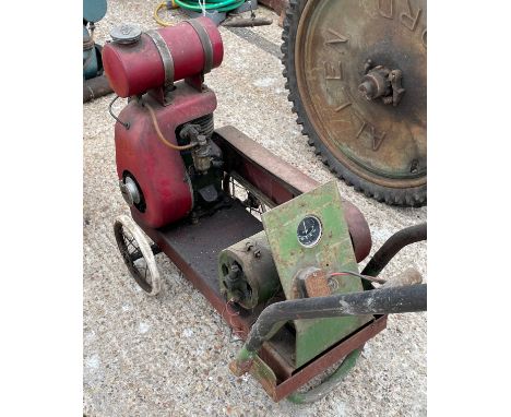 A petrol driven battery charger, having a Villiers engine.
