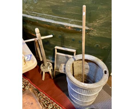 A large leather trunk bearing the initials GTD, together with a metal washing drum, posser, wooden peggy stick and washboard 