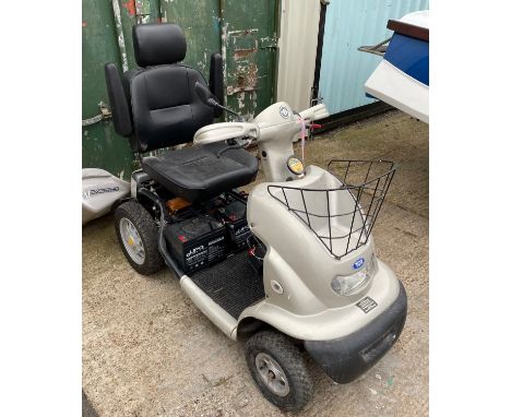 A TGA mobility scooter 'Breeze IV', model 1101000, with key and charger. (untested)