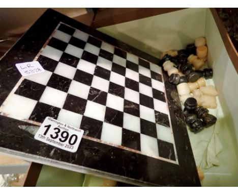 Slate chessboard together with a cigar holder and a brass bell. Not available for in-house P&amp;P 