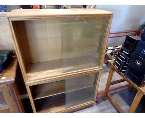 Four shelf enclosed bookcase with sliding glass doors. Not available for in-house P&amp;P 