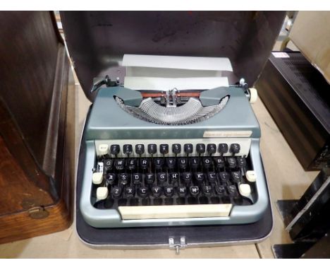 Cased Imperial good companion typewriter. Not available for in-house P&amp;P 
