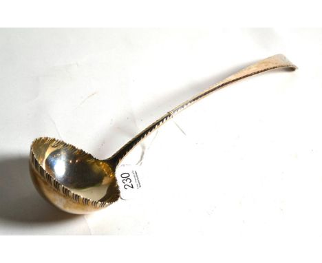 A George III silver feather edge soup ladle, Thomas Evans, London, date letter indistinct circa 1770, the bowl with shaped an