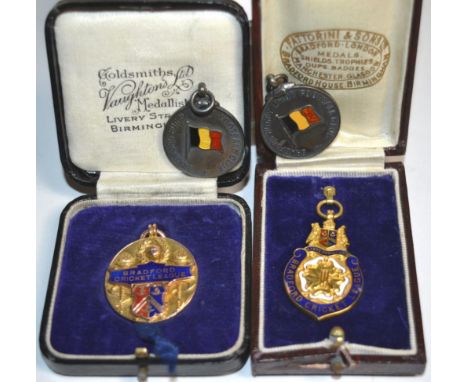 Two 9 carat gold and enamel Bradford cricket league medals, both awarded 1929 and two Bradford Rugby Union Football Club silv