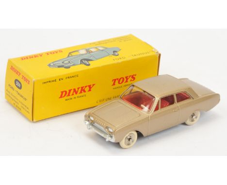 French Dinky Toys 559 Ford Taunus saloon -&nbsp; Metallic light brown,, red interior, silver trim and chrome concave hubs wit