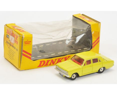 Dinky Toys 101 Vauxhall Victor Saloon - Yellow body, red interior, chrome trim and spun hubs - Good Plus overall in a Fair ye