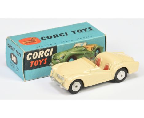 Corgi Toys 301 Triumph TR2 Sports car - Cream body, red seats, silver trim and flat spun hubs - Good including blue carded bo