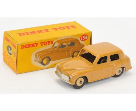 Dinky Toys 154 Hillman Minx - Tan body, silver trim, light beige rigid hubs (small baseplate lettering) - Good Plus to Excell