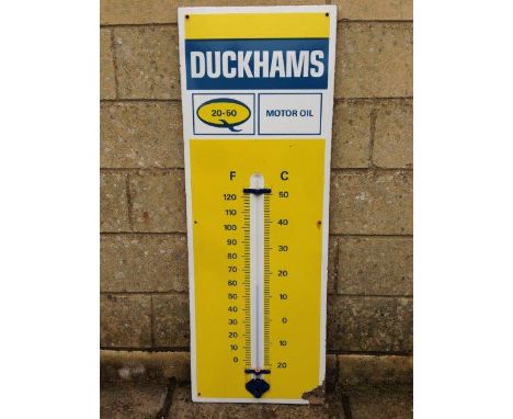 A Duckhams 20-50 Motor Oil enamel thermometer, 13 x 36 1/2".