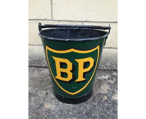 A bucket with swing handle and BP shield motif. 