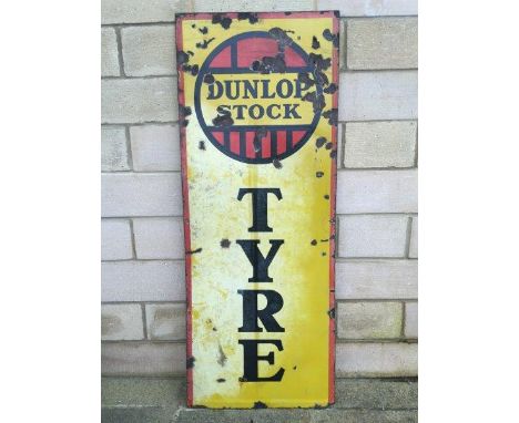 A Dunlop Stock Tyre rectangular enamel sign, 20 x 51".