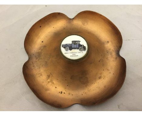 A Morris Commercial Cars Limited copper ashtray with central enamel disc depicting an Edwardian Morris Truck. 