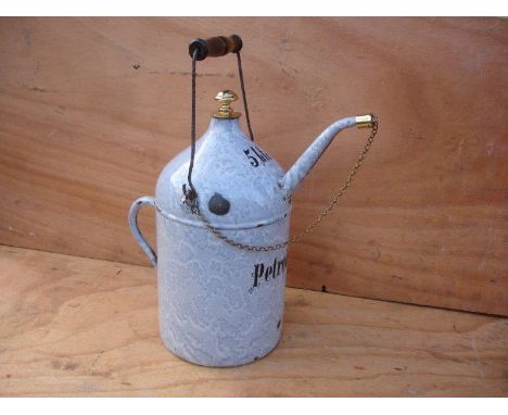 A five litre French petrol container in an unusual rain drop pattern enamel, circa 1900.