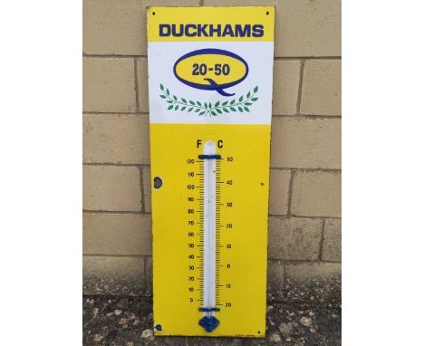 A Duckhams 20-50 enamel thermometer by Burnham of London, 13 x 36"