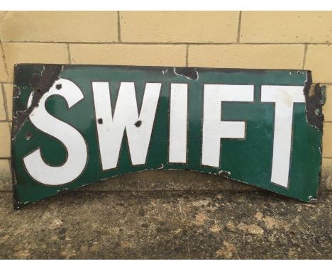 A rare Swift shaped enamel sign, 48 x 21". 