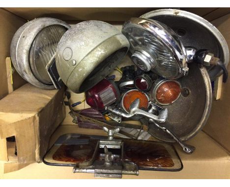 A sun visor with original bracketry circa 1934, a pair of sun visor brackets and a selection of assorted lamps including Luca