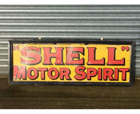 A Shell Motor Spirit rectangular enamel sign set within a wooden frame, 55 1/2 x 20 1/2"