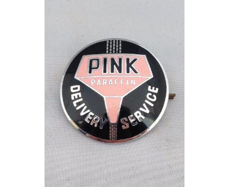 A Pink Paraffin Delivery circular enamel badge. 