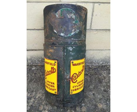 A Wakefield Castrol semi-circular wall hanging cabinet with two Castrollo upper cylinder lubricant enamel panels, in excellen