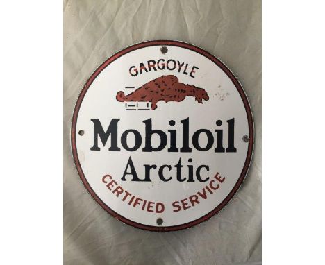 A Small Mobiloil Arctic convex enamel sign, 9" diameter.