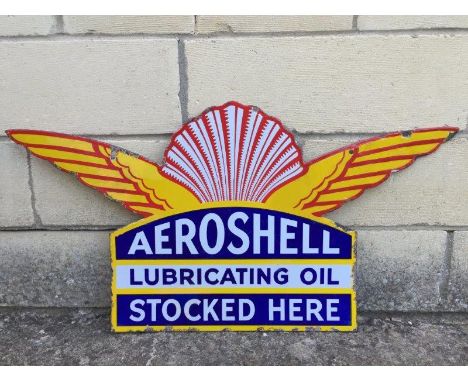 An Aeroshell Lubricating Oil Stocked Here double sided hanging enamel sign with some retouching and professional restoration,