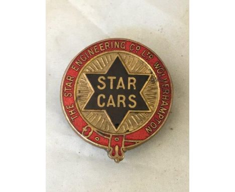 A Star Cars enamel lapel badge by Thomas Fattorini.