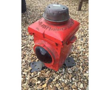 Yesterday's World Museum Bicycle Repair Shop - a red painted road lamp with bullseye red glass lens to either side. 