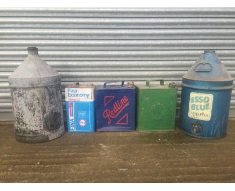 An Esso Blue five gallon cylindrical pyramid can with dispensing tap, one other, two 2-gallon petrol cans including one Redli